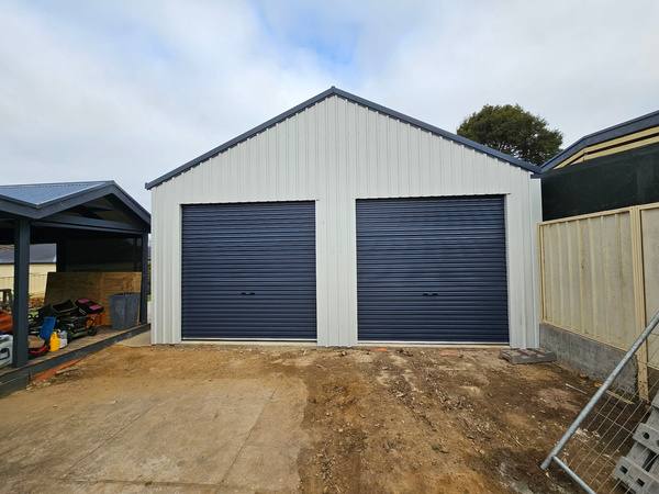 White double garage by Blackbird Industries